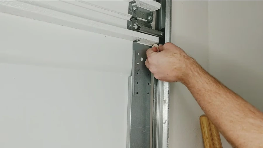 Garage door repair technician working in Bloomington, IL